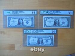 1957B (3) $1 Consecutive Blue Seal Silver Certificates Graded PMG 64 Choice Unc